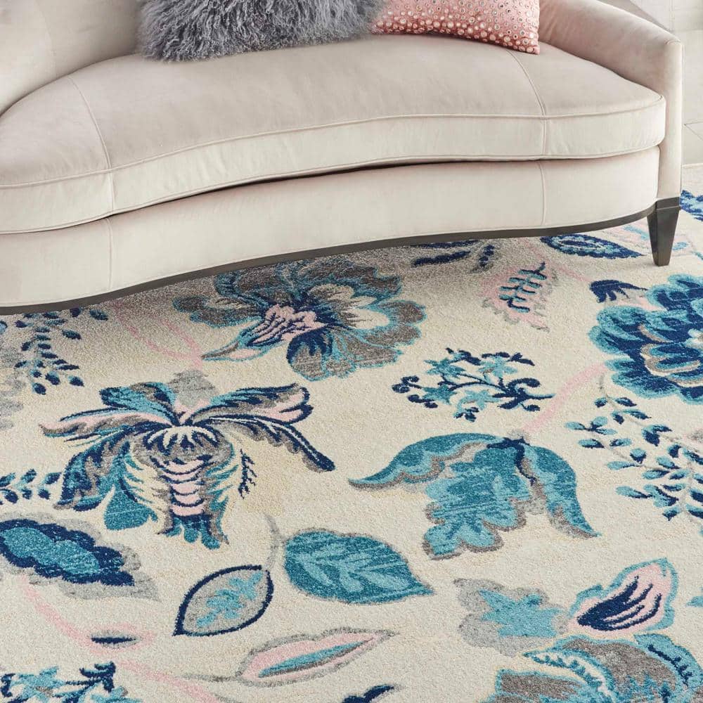 Elegant Ivory and Light Blue Floral 8' x 10' Synthetic Area Rug