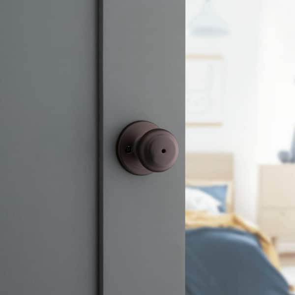 Cove Venetian Bronze Privacy Door Knob with Lock for Bedroom or Bathroom featuring Microban Technology