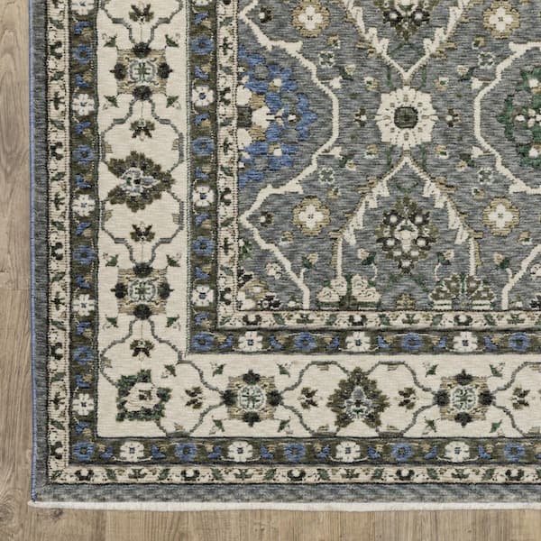 7' X 10' Navy Blue Tan And Black Medallion Area Rug With Fringe