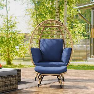 Beige Wicker Egg Chair with Outdoor Ottoman and Blue Cushion