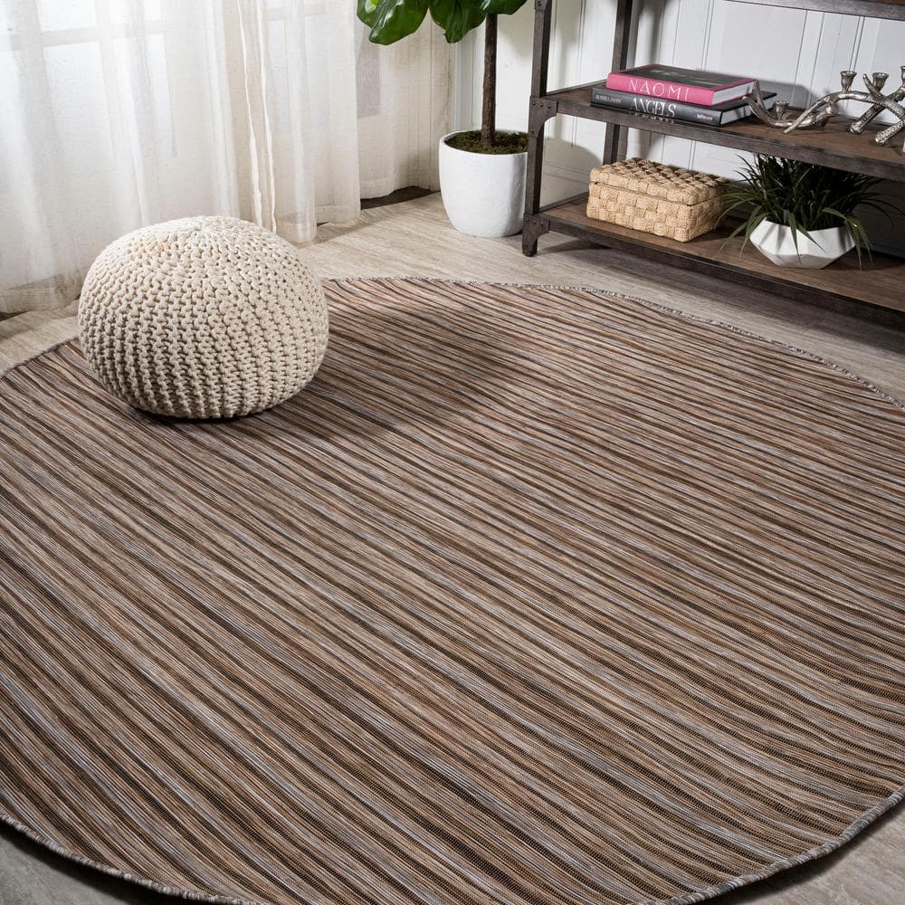 https://images.thdstatic.com/productImages/3b689219-811e-49d0-8dc1-d2c5cdaca173/svn/natural-brown-jonathan-y-outdoor-rugs-tsn102b-6r-64_1000.jpg