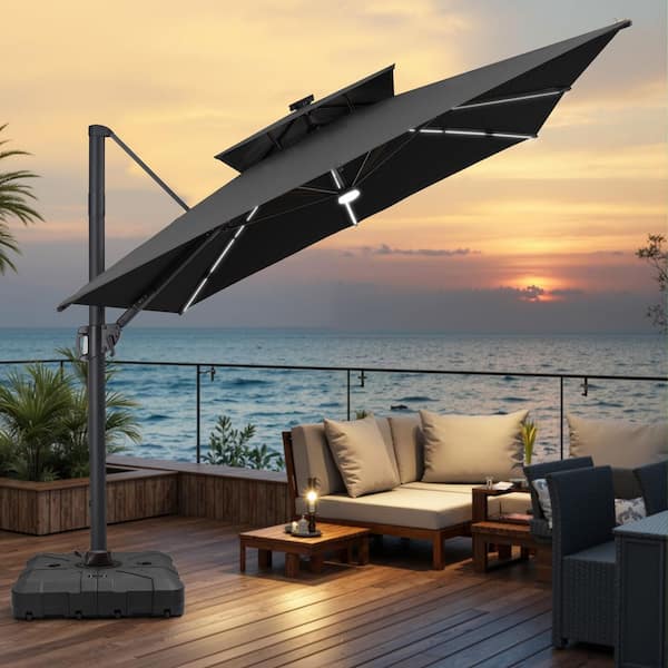 black offset cantilever hanging patio umbrella with dual wind vent Pellebant 9 ft. x 11 ft. Dual Top Solar LED Patio Umbrella Outdoor 360° Rotation Cantilever Offset Umbrella in Black with Base