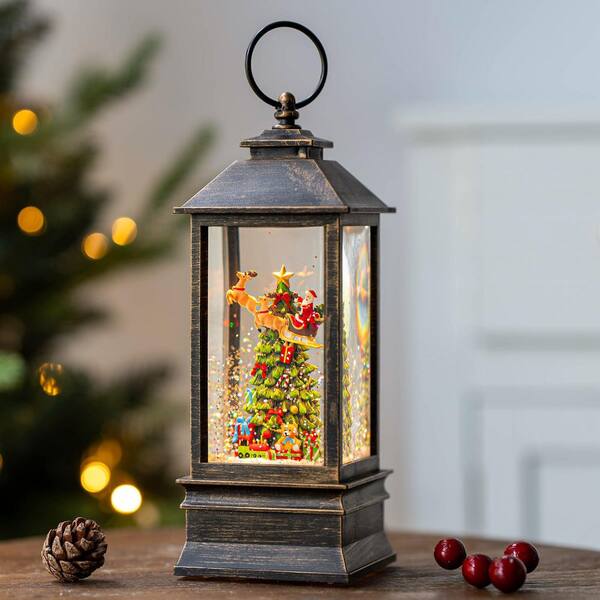 Christmas Tree and Flying Santa Musical Snow Globe 10 in. x 5 in