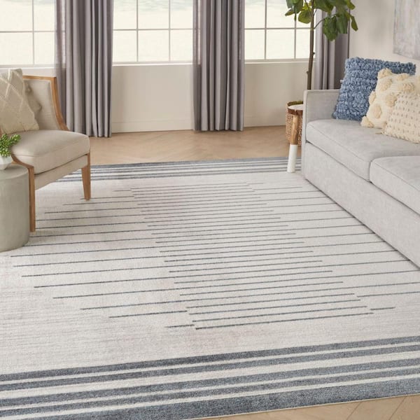 Astra Machine Washable Ivory Blue 8 ft. x 10 ft. Striated Contemporary Area Rug
