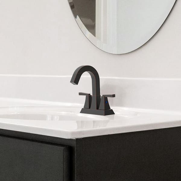 Rotatable 4 in. Centerset Double Handle Bathroom Faucet with Drain Kit Included in Oil Rubbed Bronze