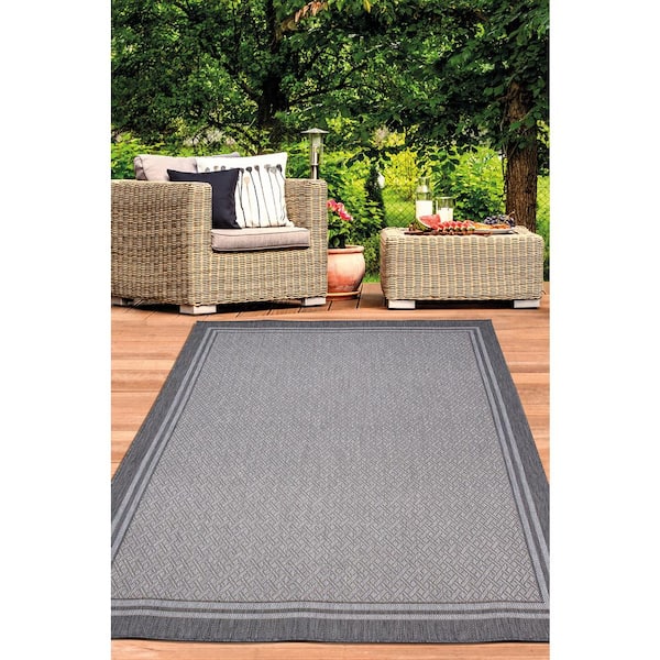 https://images.thdstatic.com/productImages/3b9c85a7-425f-4c79-9694-b249750fd02f/svn/gray-ottomanson-outdoor-rugs-jrd8753-5x7-76_600.jpg