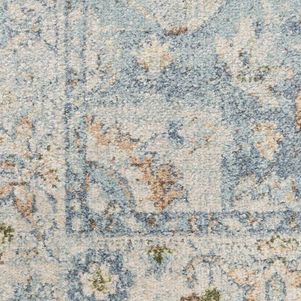 7 X 9 Blue and Ivory Floral Medallion Power Loom Distressed Washable Area Rug