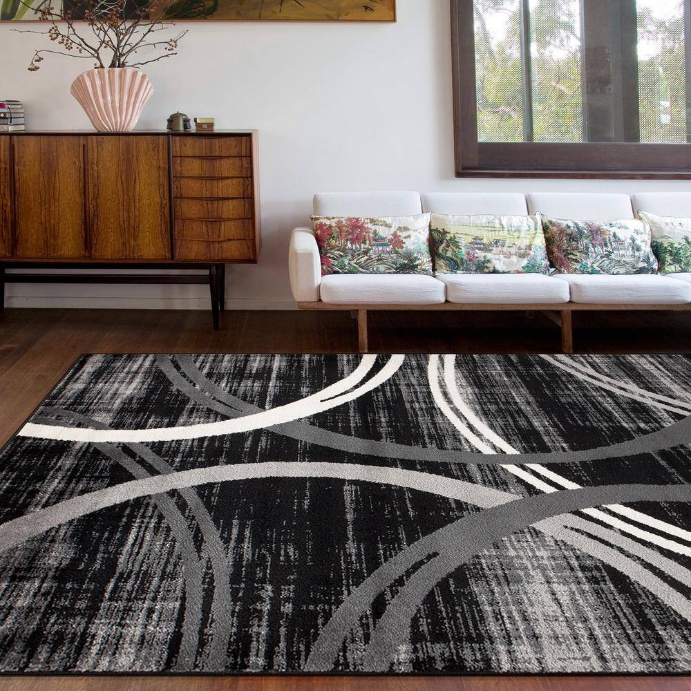 Modern Black and Gray Abstract Oval Area Rug, 5' x 7'
