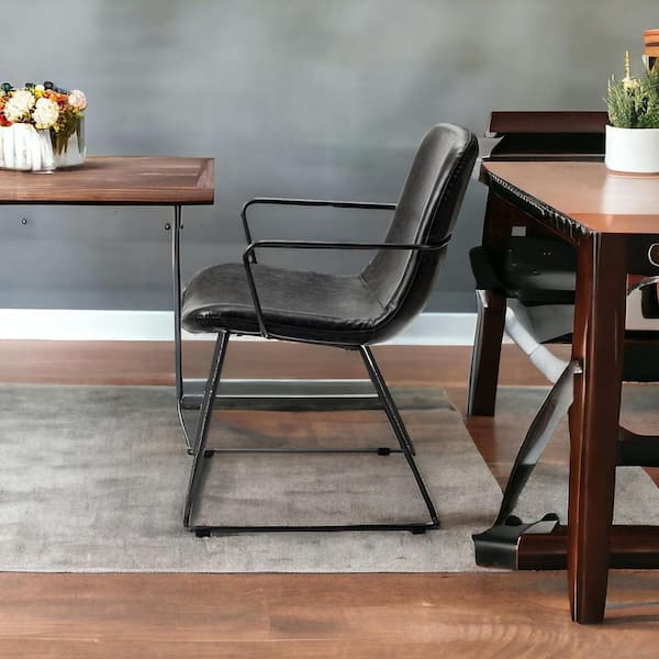 HomeRoots Black Upholstered Faux Leather Arm Chair