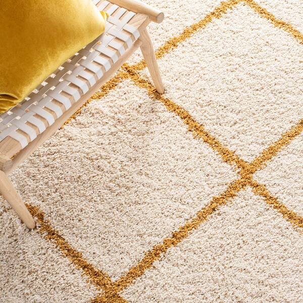 SAFAVIEH Hudson 7 ft. x 7 ft. Ivory/Gold Geometric Round Rug