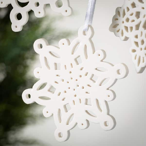 The snowflake ornament is made of light weight Styrofoam then