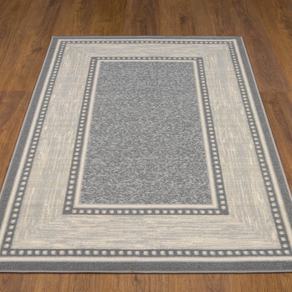 https://images.thdstatic.com/productImages/3bef4743-5bc4-4e83-81a9-a19b2bf0b7eb/svn/2203-gray-ottomanson-area-rugs-oth2203-3x5-fa_600.jpg