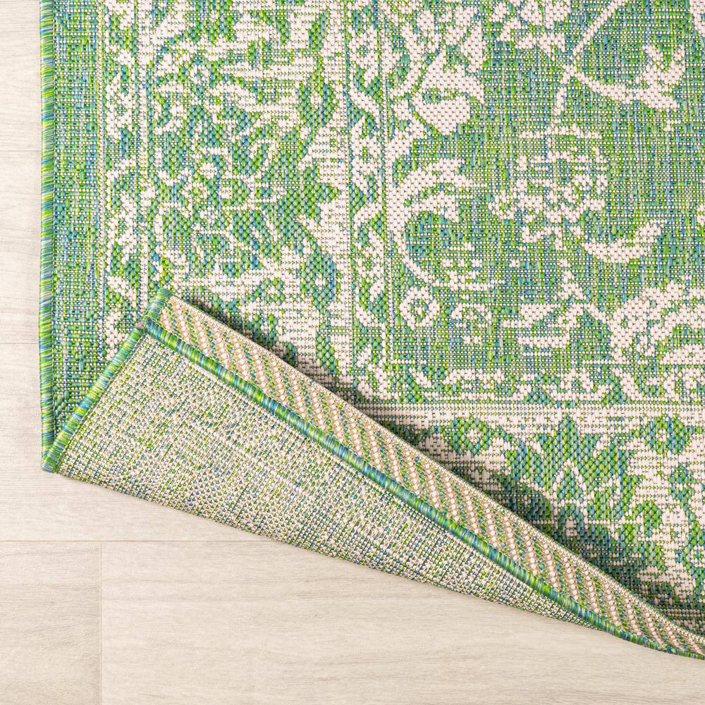 9' x 12' Green and Cream Floral Synthetic Rectangular Area Rug