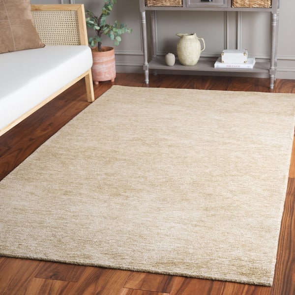 Ebony 5 ft. x 8 ft. Gold/Ivory Solid Color Area Rug