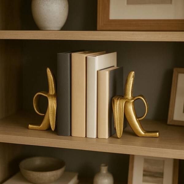 Liv & Skye 8.75 in. Gold Aluminum Suar Banana Bookends (Set of 2