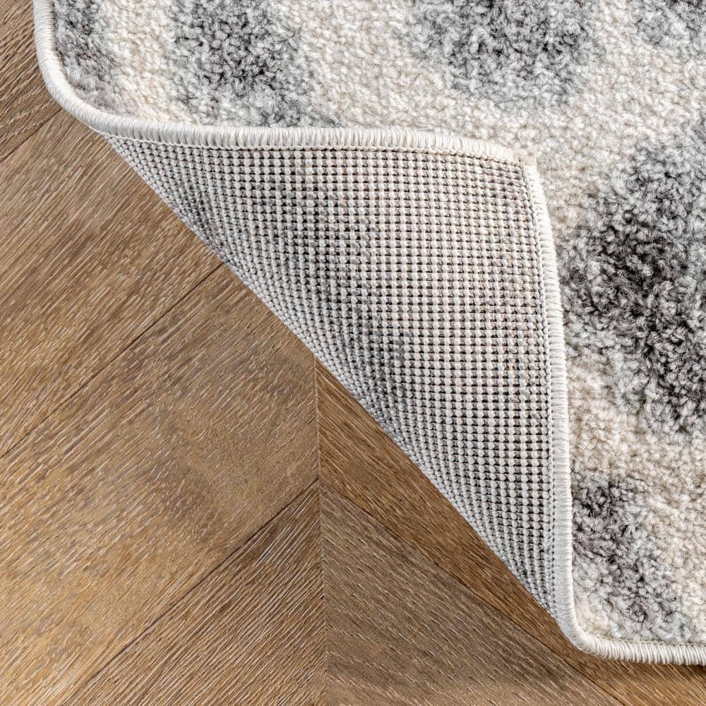 Gray Leopard Print Tufted Synthetic Area Rug