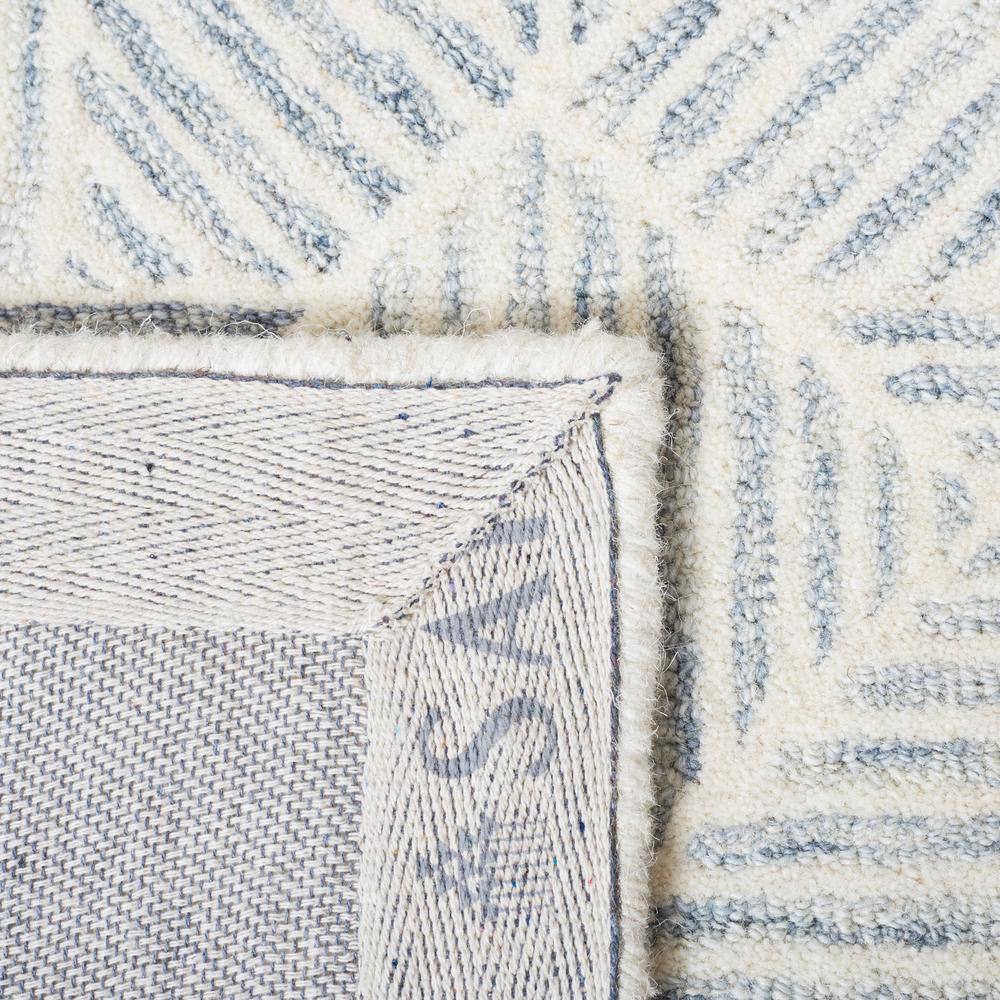 Grey and Ivory Abstract Wool 4' x 6' Handmade Area Rug