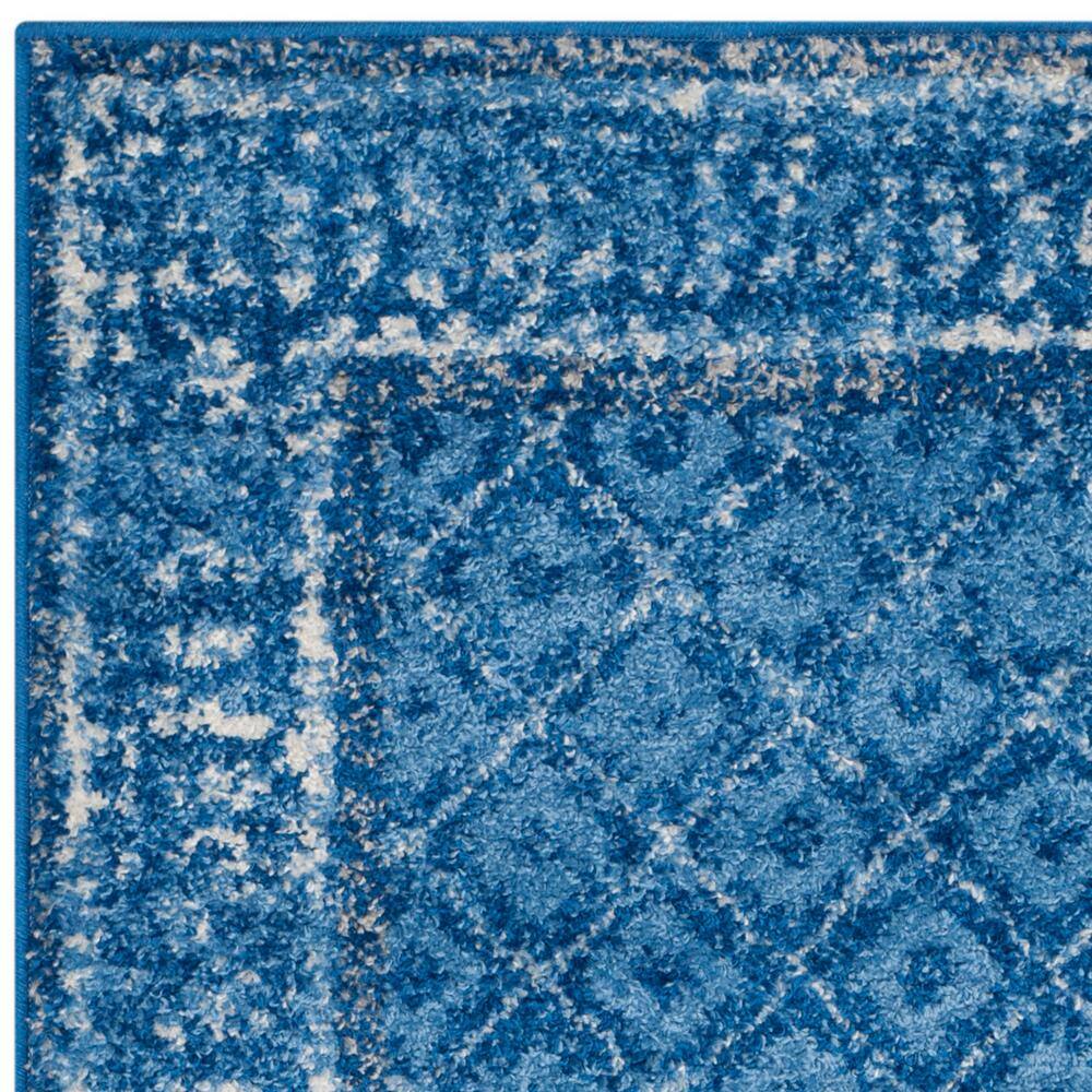 Light Blue and Dark Blue Floral Motif Area Rug