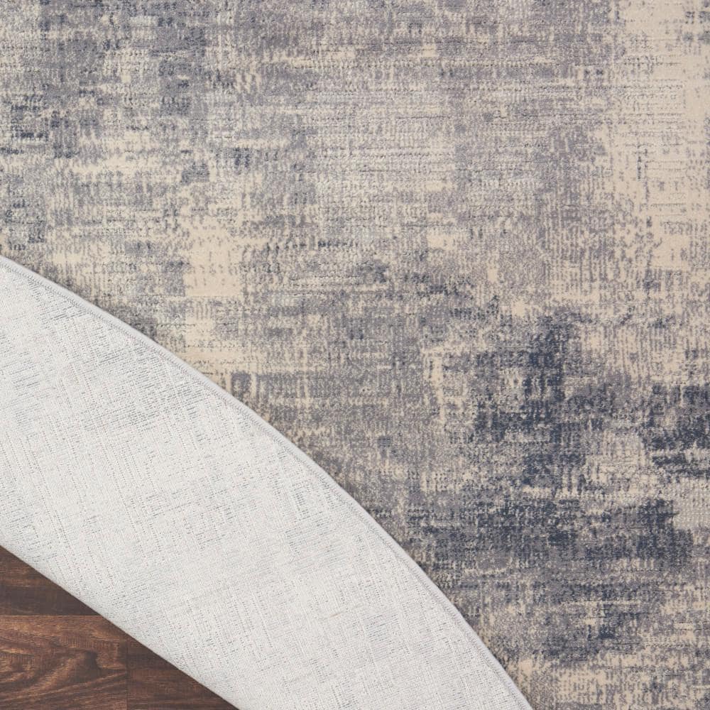 Round Blue and Ivory Abstract Area Rug 7'10"