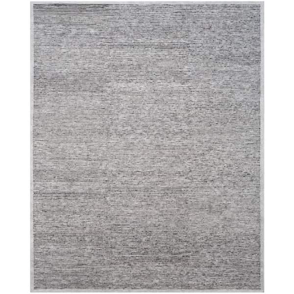 Tibetan 9 ft. x 12 ft. Gray Solid Color Area Rug