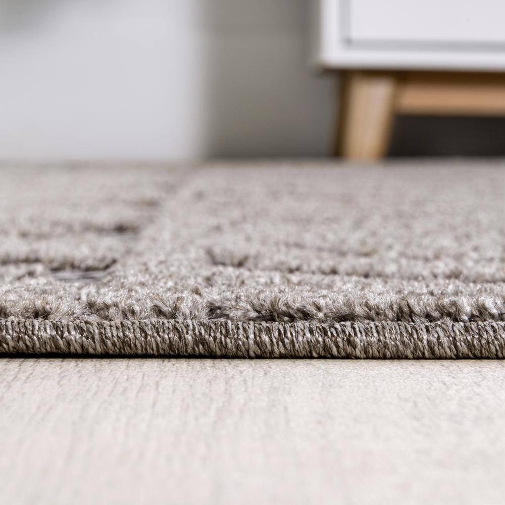 Dark Gray and Ivory Geometric Synthetic Indoor/Outdoor Area Rug