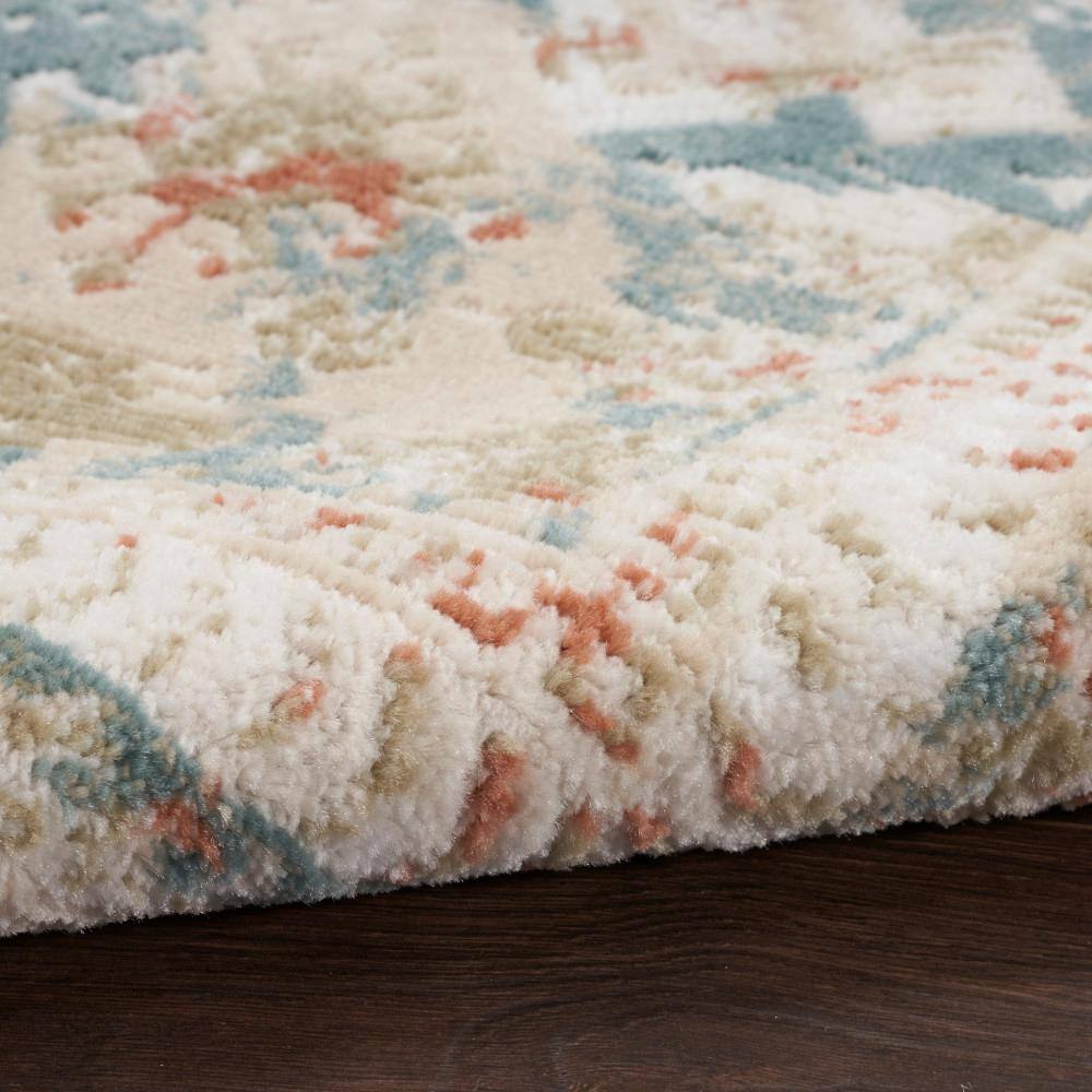 Thalia Green & Ivory Geometric 6' x 9' Easy-Care Area Rug