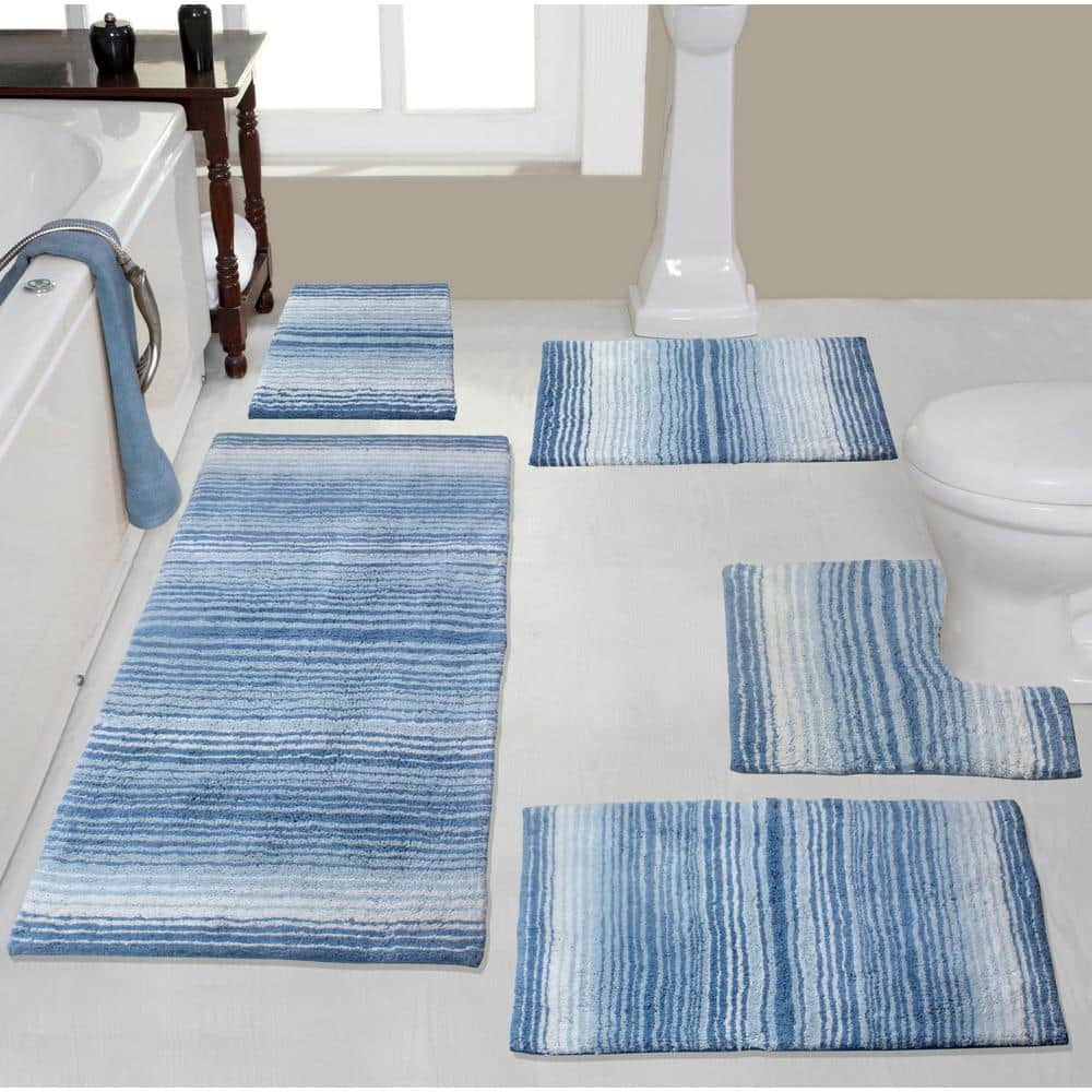 https://images.thdstatic.com/productImages/3c68fcbe-3c2d-4e36-b916-ca3df7bae457/svn/blue-bathroom-rugs-bath-mats-bgrd5pcbl-64_1000.jpg