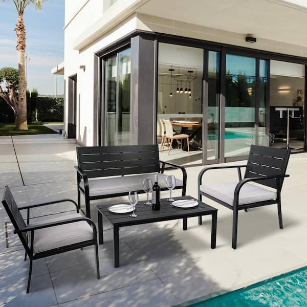 Sungrd 4-Piece Steel Patio Conversation Set with machine-washable Cushions, Coffee Table and ergonomic design, Black and Gray