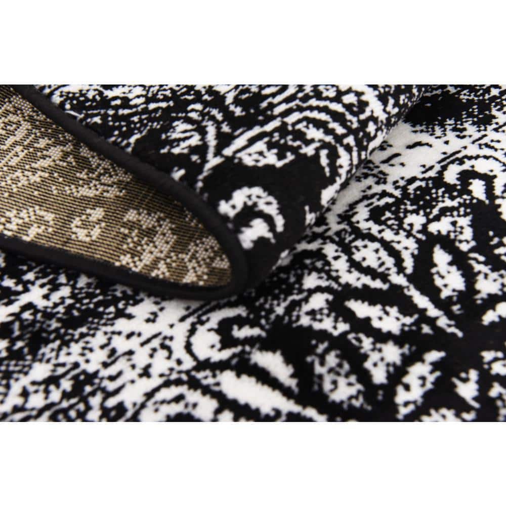 Grand Sofia 9' x 12' Black Reversible Stain-Resistant Area Rug