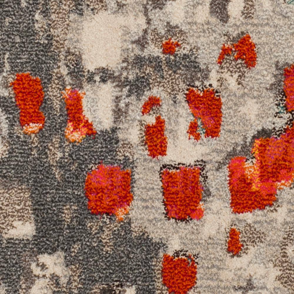 9' Round Grey and Orange Geometric Synthetic Area Rug