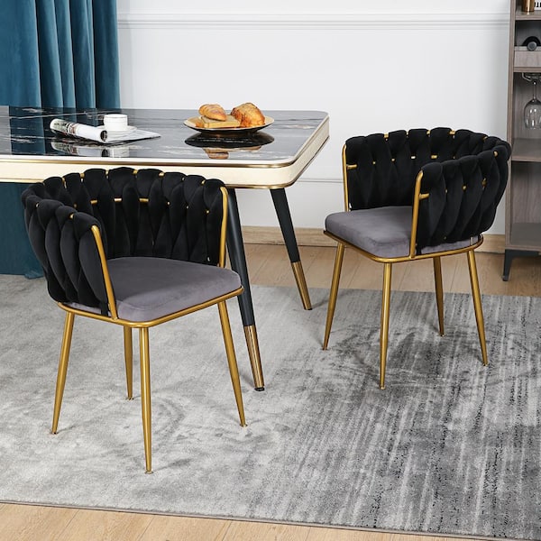 Black chairs with online gold legs