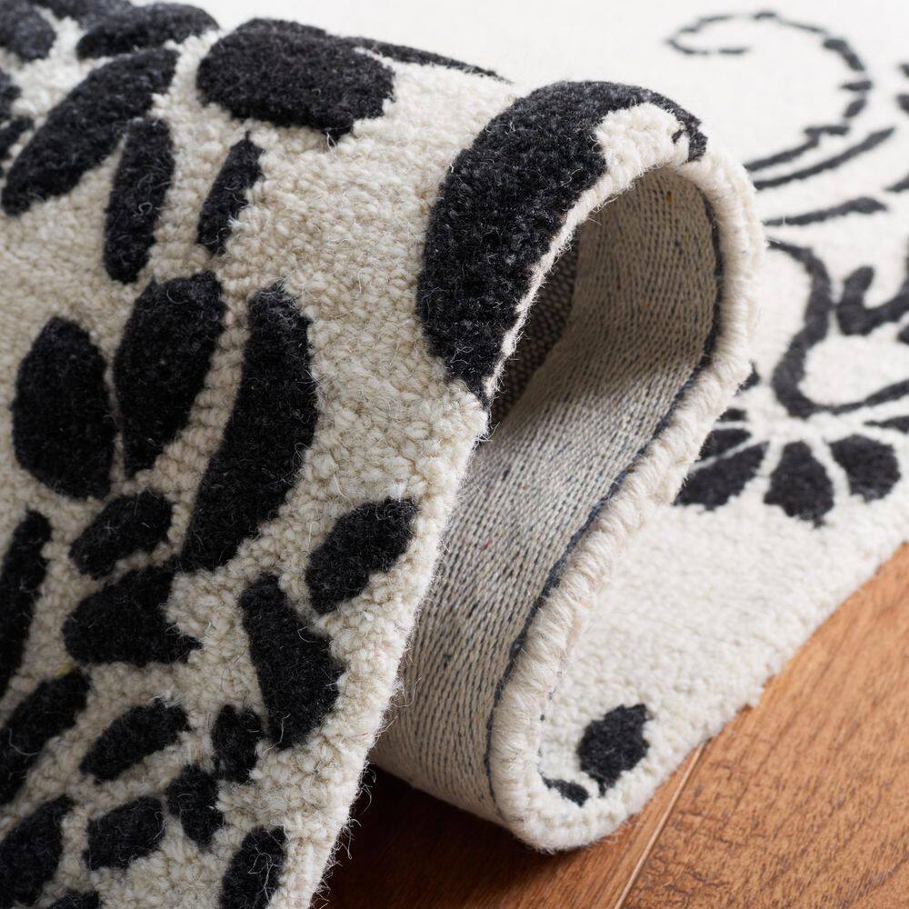 Ivory and Black Floral Hand-Tufted Wool Round Rug