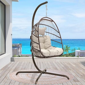 Foldable 350 lbs. 1 Person Brown Wicker Porch Swing Egg Chair with Gold Stand Beige Cushions