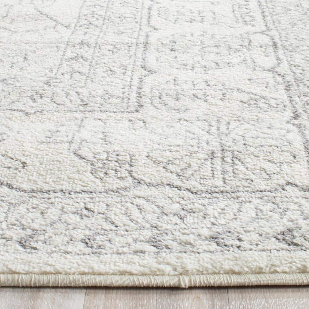 Ivory and Silver Medallion Synthetic Runner Rug