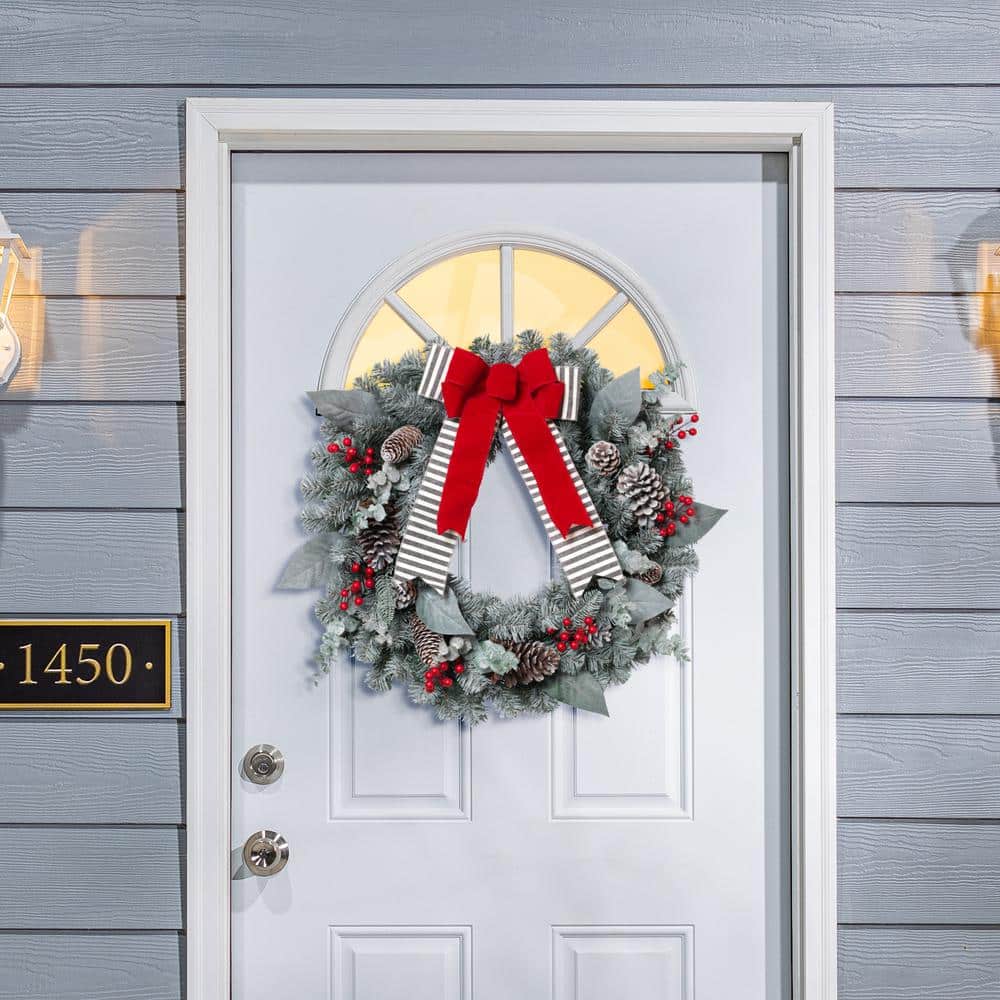 Snowy Pine Christmas Wreath with Red Bow and Pinecones