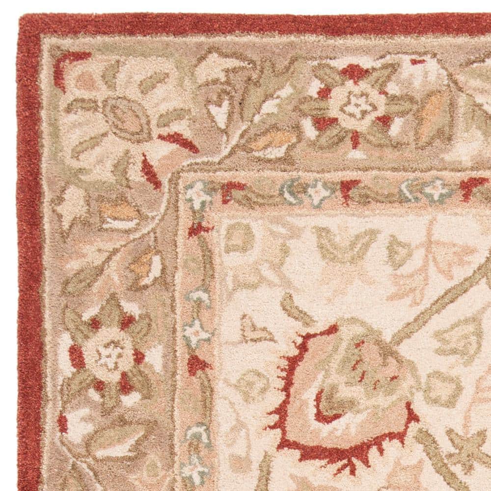 Handmade Beige and Rust Floral Wool Area Rug, 5' x 8'