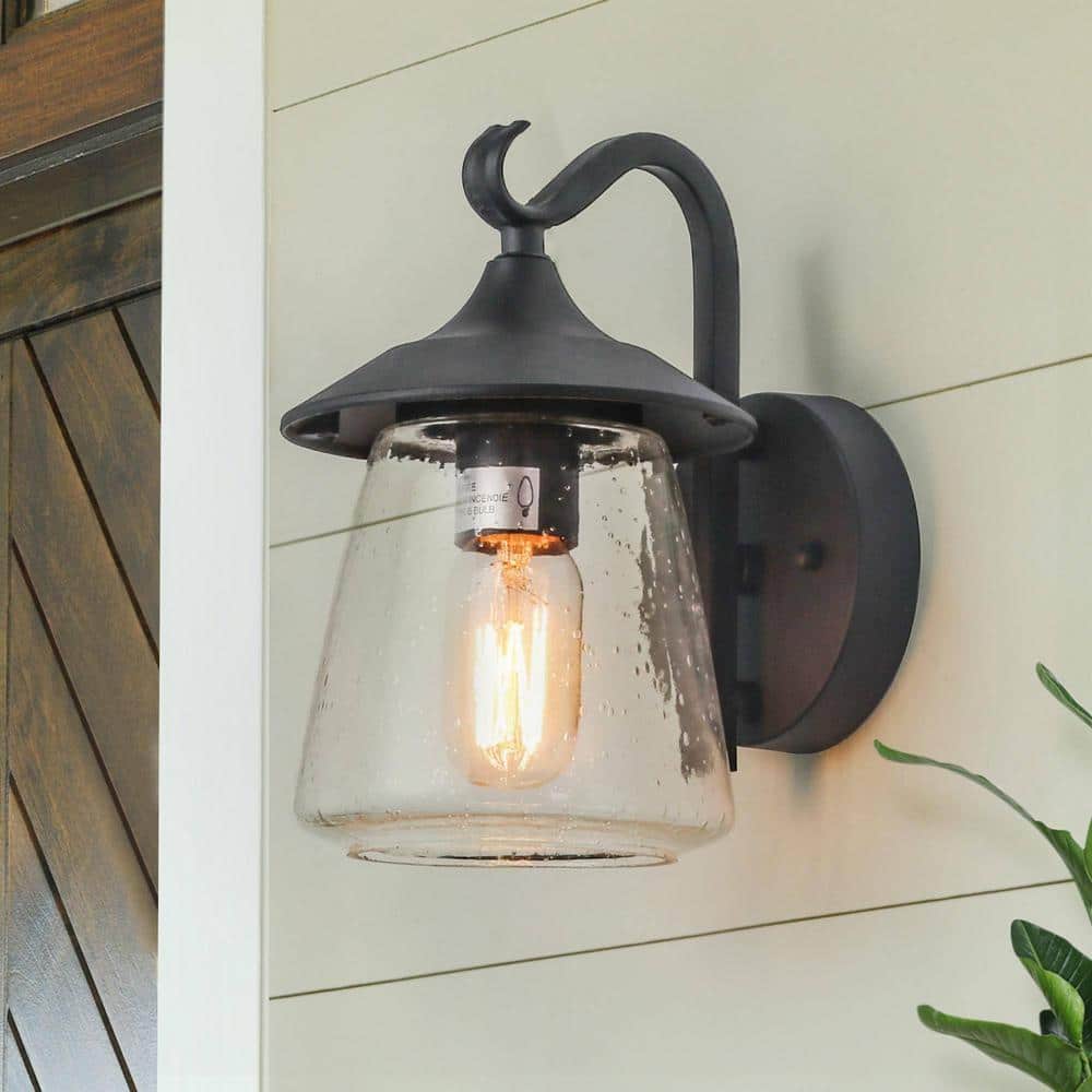 Modern Black Metal Outdoor Lantern Sconce with Seeded Glass