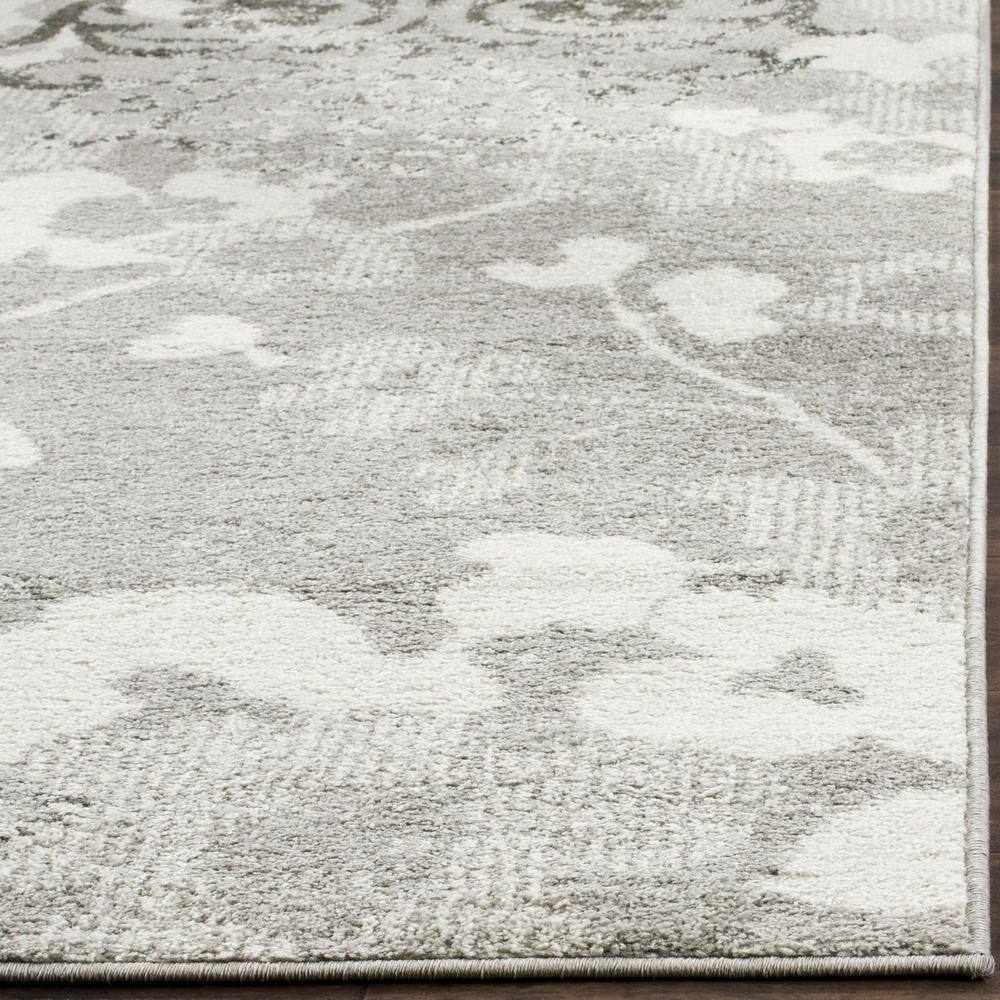 Silver and Ivory Floral Reversible 4' x 6' Synthetic Rug