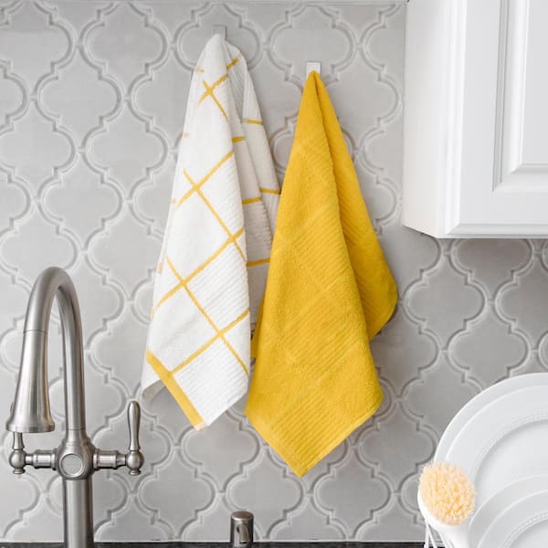 https://images.thdstatic.com/productImages/3cdc84b3-d77a-4486-8d1d-56521131b7ae/svn/yellows-golds-t-fal-kitchen-towels-60943a-44_600.jpg