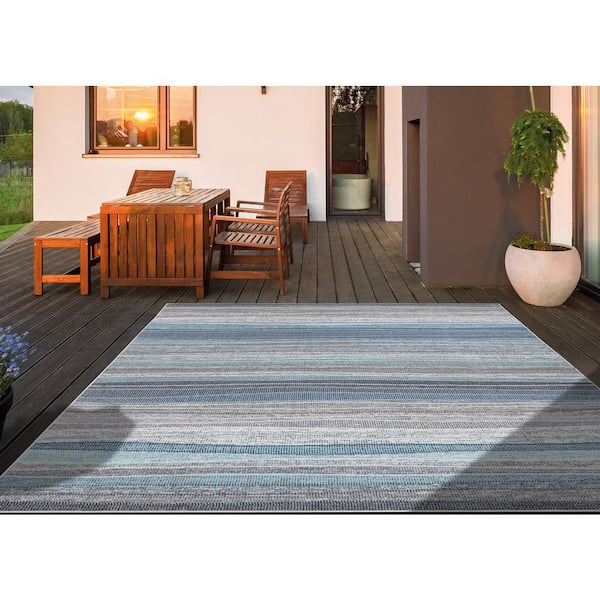 https://images.thdstatic.com/productImages/3d096c9c-0544-4a64-afe1-7c2e16af62d7/svn/multi-stylewell-outdoor-rugs-40165-fa_600.jpg