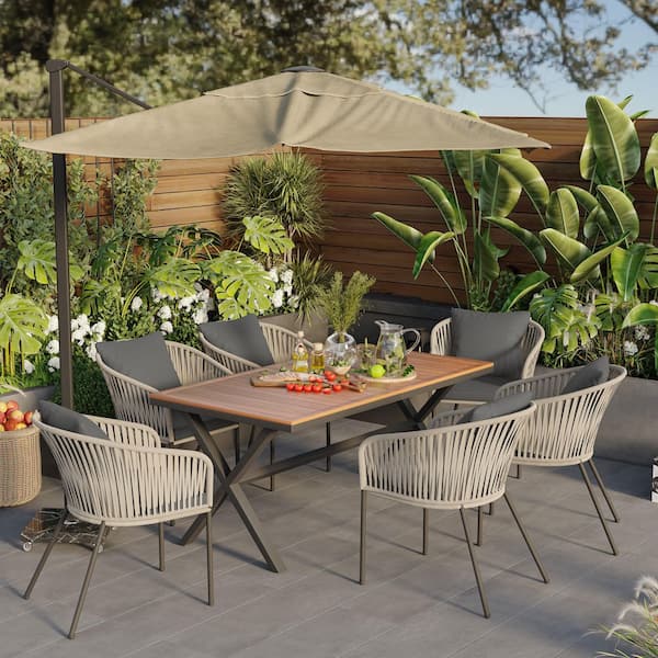 7-Piece Metal Outdoor Dining Set with Gray Cushions and Pillows