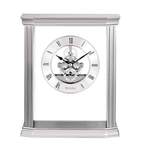 Cafe Skeleton table clock in silver with glass accents. Quartz movement and Roman numerals