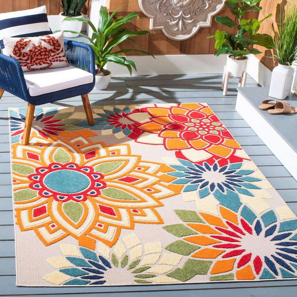 Ivory and Orange Floral Synthetic 8' x 10' Reversible Rug