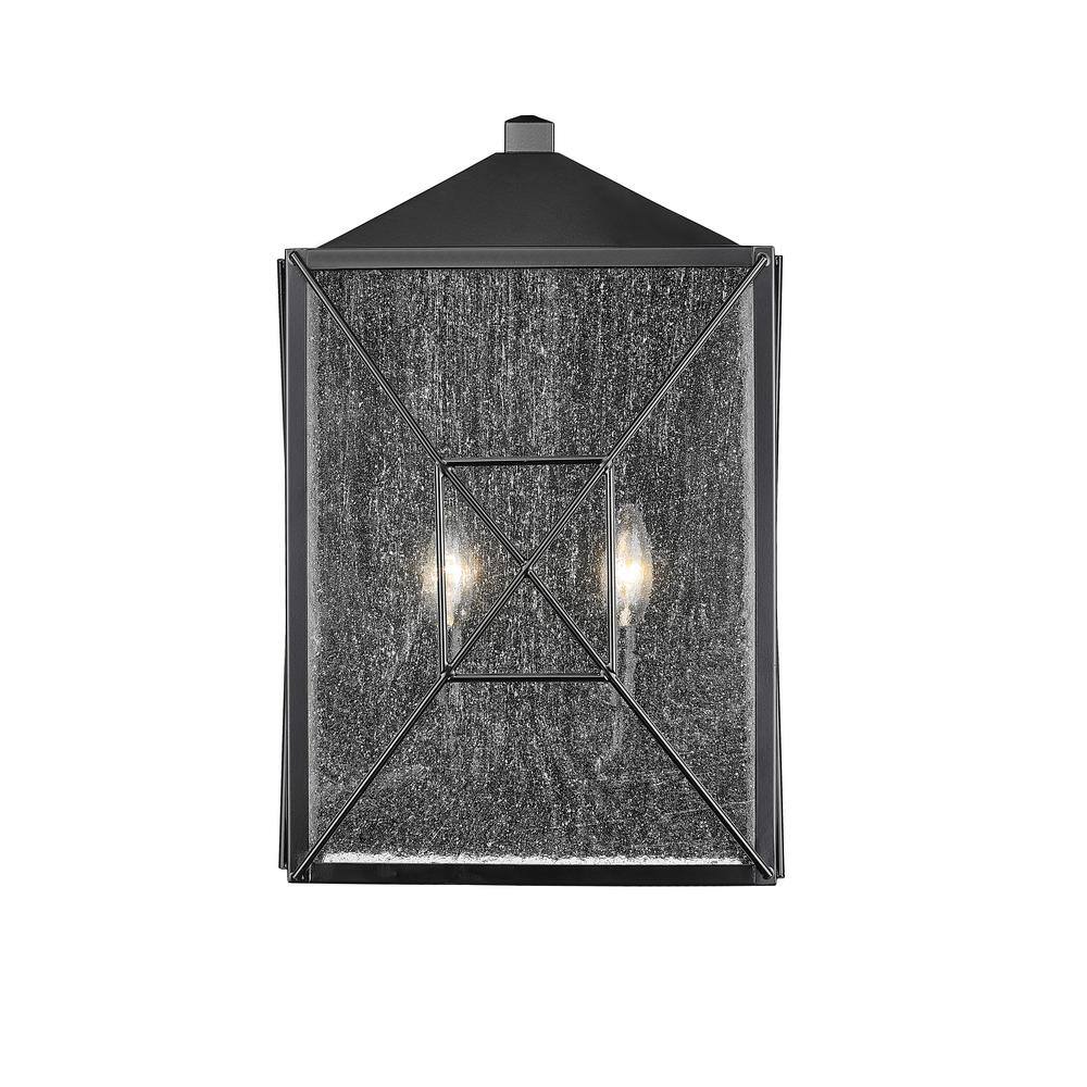 Caswell Black Metal Outdoor Wall Sconce with Clear Glass