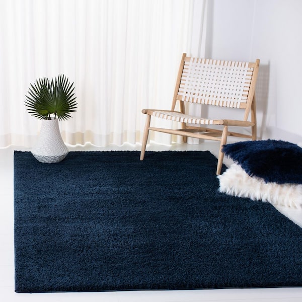 August Shag 8 ft. x 10 ft. Navy Solid Color Area Rug