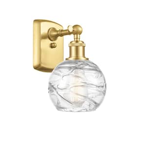 Athens Deco Swirl 1-Light Satin Gold Wall Sconce with Clear Deco Swirl Glass Shade