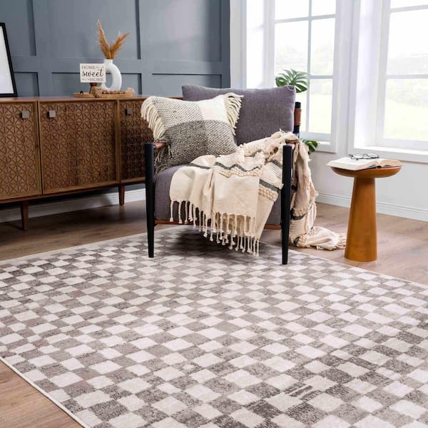 https://images.thdstatic.com/productImages/3d64f93b-bde0-4d01-bcf8-d22ab21f357f/svn/brown-beige-cream-hauteloom-area-rugs-hptkbenjya1-07101000-e1_600.jpg