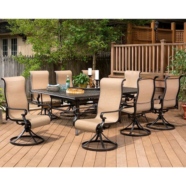 Brigantine 9-Piece Aluminum Outdoor Dining Set with an XL Cast-Top Table and 8-Slingback Swivel Rockers