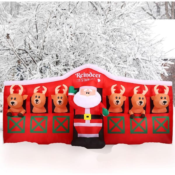 9 ft. Wide Pre-Lit Inflatable Santa in Reindeer Stable
