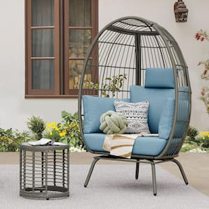 Gray Wicker Egg Chair with Outdoor Side Table and Blue Cushion